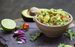 Perfect guacamole recipe with avocado, tomato and red onion