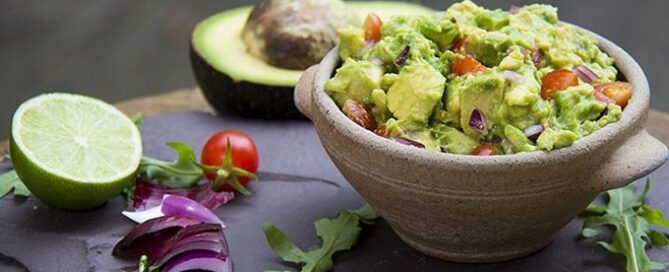 Perfect guacamole recipe with avocado, tomato and red onion