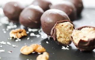 Raw chocolate covered truffles. Walnut date style by Anastasia at Kind Earth