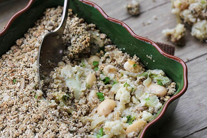 Vegan butter bean bake with creamed coconut and an oat crumble topping