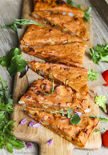 Parsnip and potato farinata slice with chickpea flour. Gluten-free, vegan by Anastasia, Kind Earth