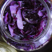 Homemade sauerkraut in a jar 3 different wasy with red cabbage and ginger