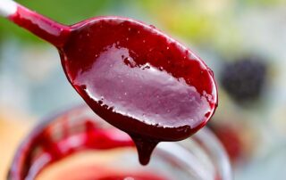 blackberry syrup on the spoon