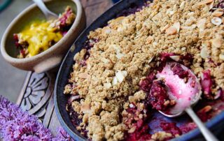 Rhubarb and blackberry crumble with oat and flaked almond topping