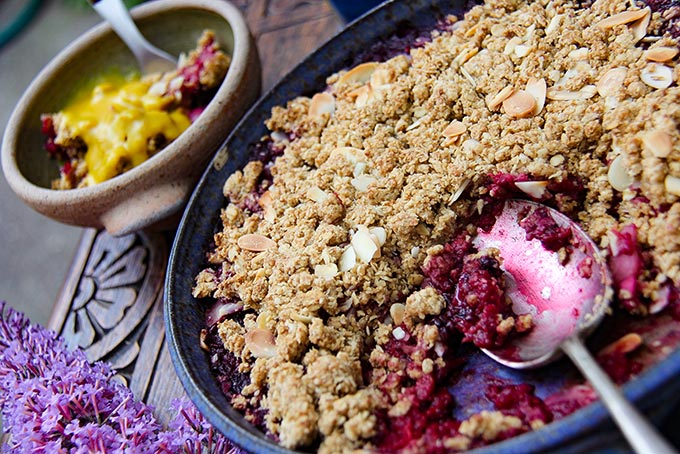 Rhubarb and blackberry crumble with oat and flaked almond topping