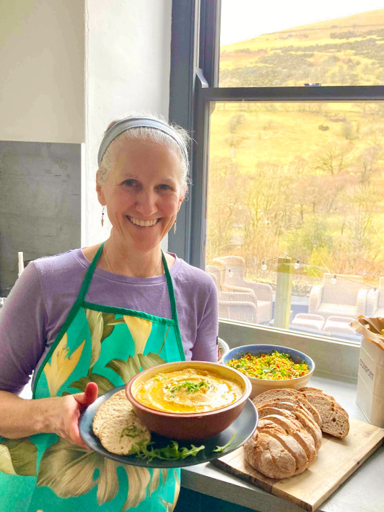 Anastasia holding the roast squash dip