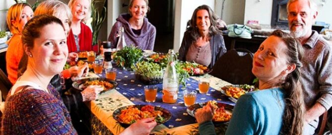 My guests eating a healthy vegan dinner on retreat in Canada - with Anastasia Eden
