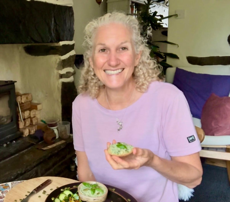 Anastasia eating raw pumpkin seed and basil pate