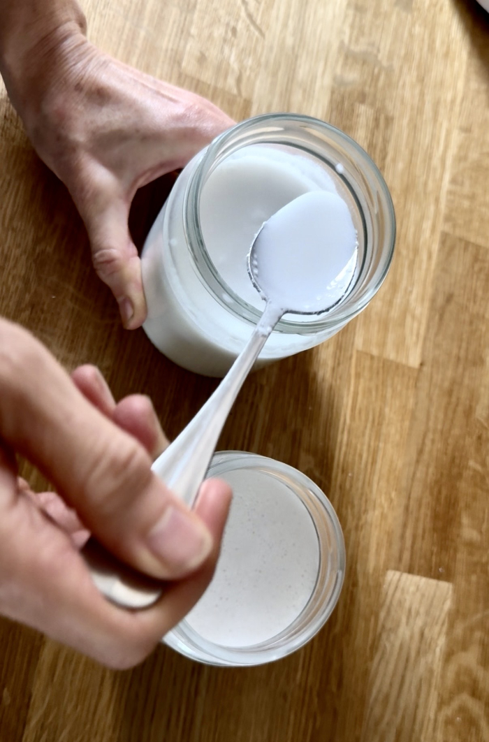 Making coconut milk from creamed coconut block